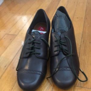 Brown leather shoes with small heel